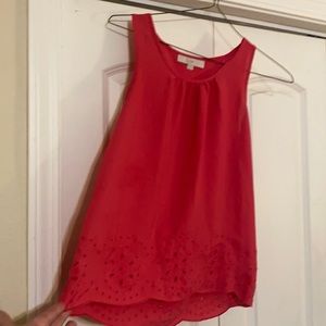 Pink tank top with Eyelet  circle design on bottom